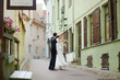 Bride and groom dancing outdoors