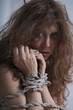beauty redhaired woman bondage