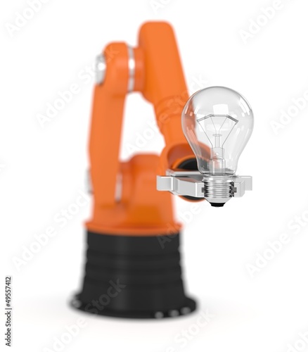Photo: Robotic arm holding light bulb Robotic arm holding light bulb