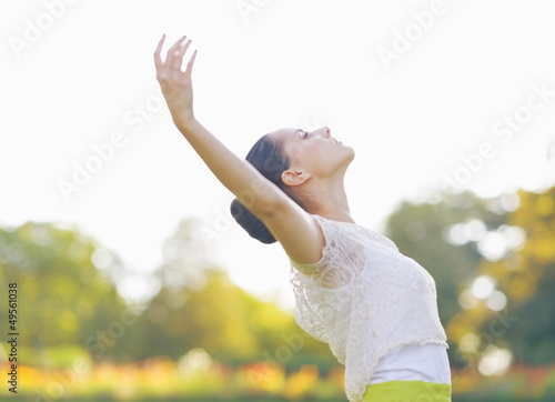 Photo: Girl enjoying spring outdoors Girl enjoying spring outdoors