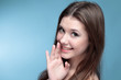 portrait of a  girl whispering.