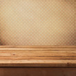 Pink vintage background with wooden deck table