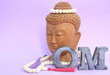 Buddha with necklace