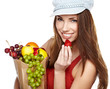 Portrait of happy young female holding a shopping bag full of gr