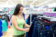 woman buys a pair of jeans