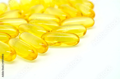 Photo: Fish oil capsule on white background Fish oil capsule on white background