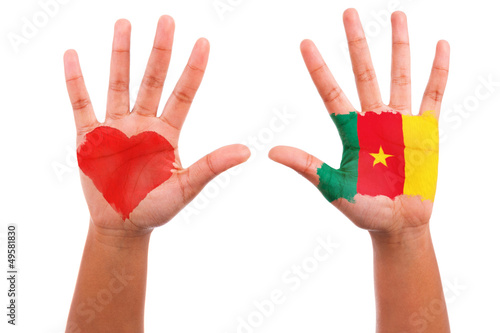Photo: African hands with a painted heart and cameroon flag, i love cam African hands with a painted heart and cameroon flag, i love cam