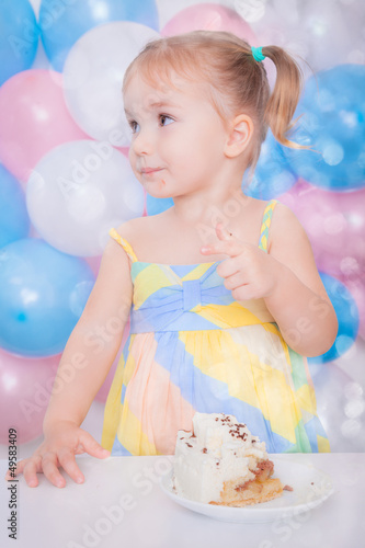 Photo: sweet little girl celebrating sweet little girl celebrating