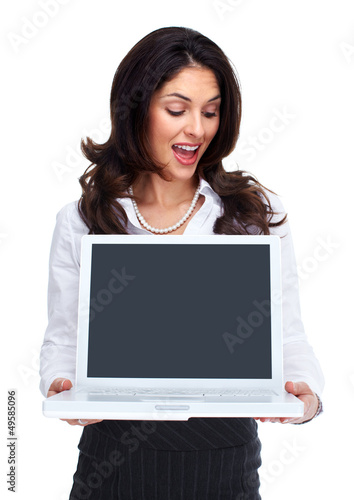 Photo: Business woman with laptop computer. Business woman with laptop computer.