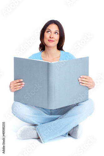 Photo: Young woman with a book. Young woman with a book.