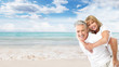 Foto: Happy senior couple on the beach. Happy senior couple on the beach.