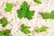 Fresh cottage cheese (curd) heap with parsley, isolated on white