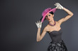 Photo: Young stylish woman with purple retro hat Young stylish woman with purple retro hat