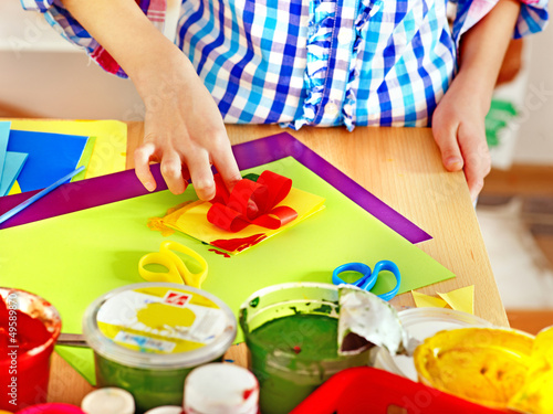 Photo: Child making decoration card.. Child making decoration card..