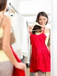 Photo: Shopper woman trying clothing dress shopping Shopper woman trying clothing dress shopping