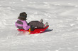 Jeune fille en luge