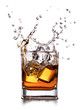 whiskey splash with ice cubes isolated on white