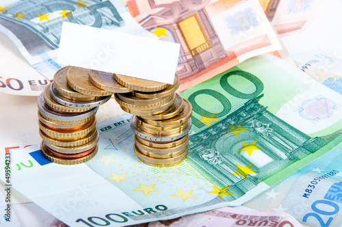 Photo: Geld mit Blankoschild Geld mit Blankoschild