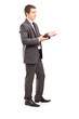 Full length portrait of a professional male shot during a conver