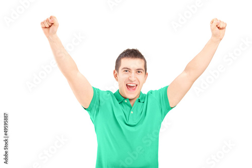 Photo: Handsome guy gesturing happiness Handsome guy gesturing happiness