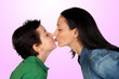 Adorable mother kissing her beautiful son