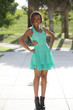Photo: Stock image of a woman posing in a teal dress Stock image of a woman posing in a teal dress