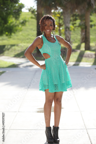 Photo: Stock image of a woman posing in a teal dress Stock image of a woman posing in a teal dress