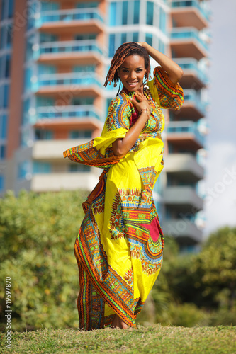 Photo: Stock image of a woman posing in an African dress Stock image of a woman posing in an African dress