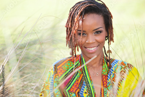 Photo: Attractive African American woman smiling Attractive African American woman smiling