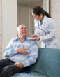 friendly doctor asks mature man feels