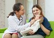  doctor examining newborn baby