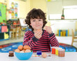 Adorable Student Painting Easter Eggs