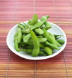edamame nibbles, boiled green soy beans, japanese food