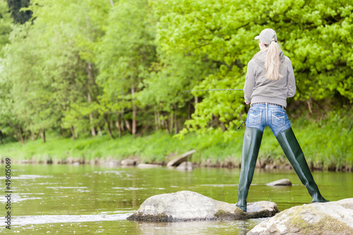 Photo: woman fishing in Sazava river, Czech Republic woman fishing in Sazava river, Czech Republic