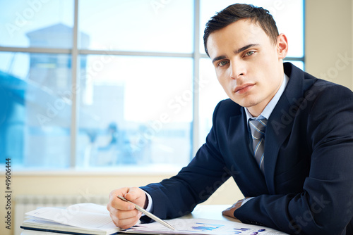 Photo: Businessman at workplace Businessman at workplace