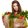 beautiful young woman with vegetables and fruits in shopping bag