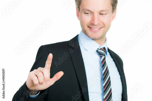 Photo: kaufmann zeigt mit den fingern kaufmann zeigt mit den fingern