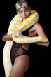 The beautiful woman with the big yellow snake