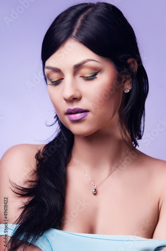 Photo: portrait of a beautiful young woman portrait of a beautiful young woman
