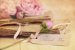 Photo: Peony flowers with vintage papers and gift card Peony flowers with vintage papers and gift card