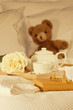 Breakfast in bed with tea and gift