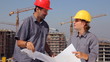 Construction workers on building of apartments, teamwork