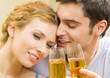Cheerful couple with champagne