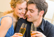 Cheerful couple with champagne