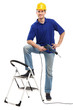 Builder with ladder and drill