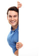 Man peeping over blank poster