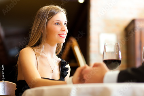 Photo: Couple having a date in a luxury restaurant Couple having a date in a luxury restaurant