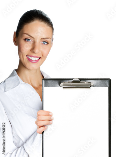 Photo: Businesswoman showing blank clipboard, on white Businesswoman showing blank clipboard, on white