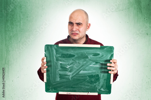 Photo: Sad man with chalkboard Sad man with chalkboard