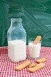 Photo: Bottle and a glass of milk with cakes Bottle and a glass of milk with cakes